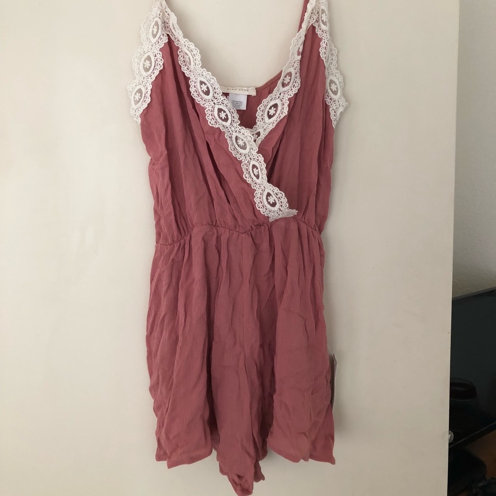Pink lace surplice romper